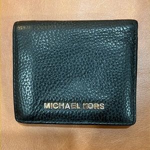 Michael Kors black pebble leather bi fold wallet